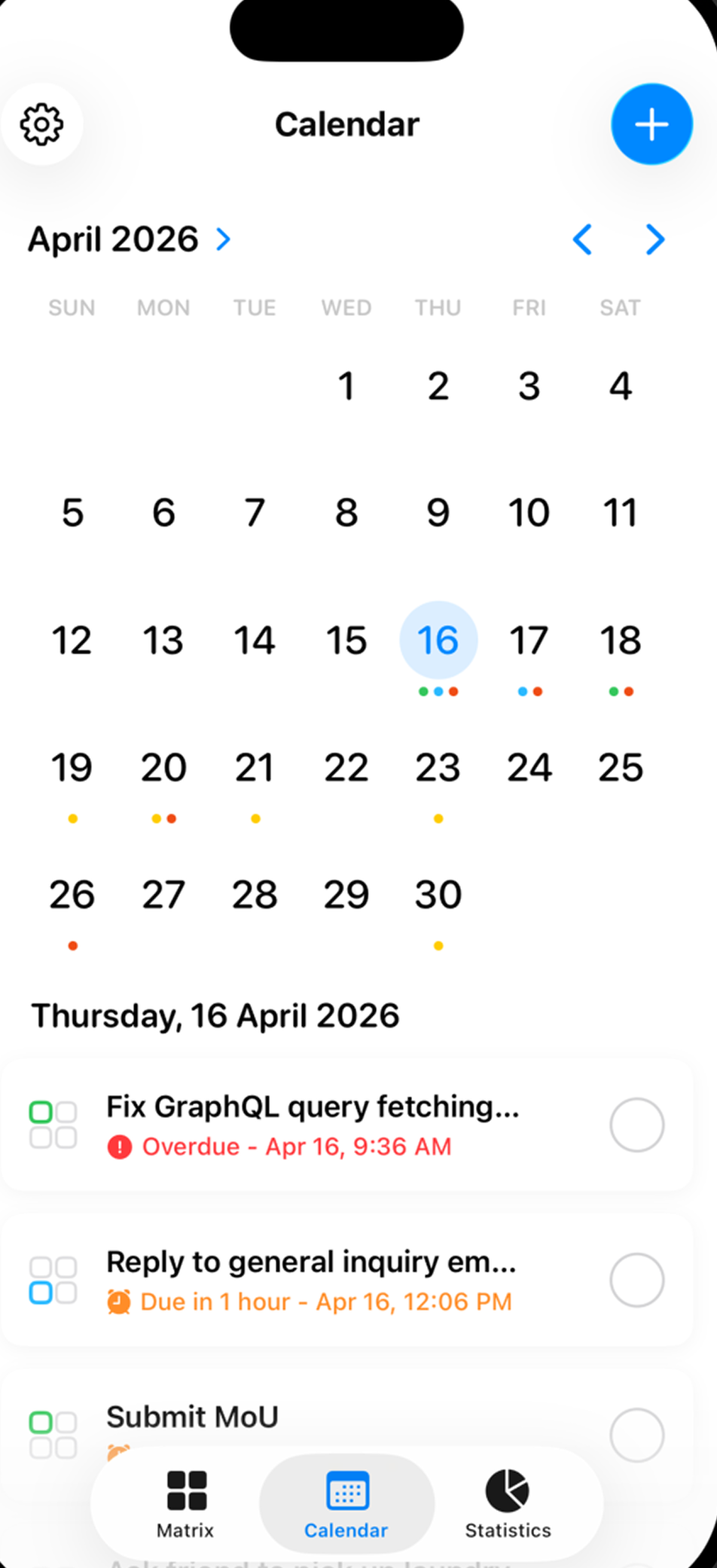 Calendar with color-coded dot indicators for task deadlines